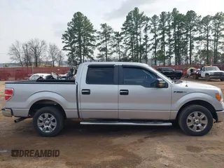 2012 Ford F-150 XL with VIN 1FTFW1CF5CFB63372, listed as a IAAI auction lot 41747703 with 202,219 mi miles. Bid and sale history available at carsss.com. Image 13.