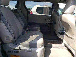 2013 Toyota Sienna XLE with VIN 5TDDK3DC1DS056128, listed as a Copart auction lot 65143524 with 64,132 mi miles and Salvage title. Bid and sale history available at DreamBid. Image 11.