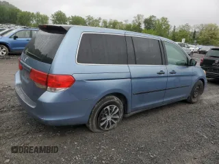 2010 Honda Odyssey LX with VIN 5FNRL3H26AB001758, listed as a Copart auction lot 58320535 with 131,373 mi miles and Salvage title. Bid and sale history available at DreamBid. Image 3.