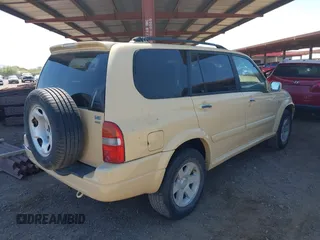 2003 Suzuki XL7 Touring with VIN JS3TX92V034106629, listed as a IAAI auction lot 42683803 with Not provided miles and . Bid and sale history available at DreamBid. Image 4.