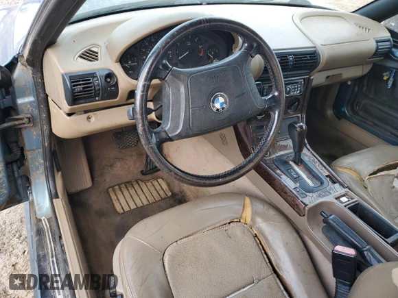 1999 BMW Z3 2.5 z VIN 4USCH9339XLG00330, wystawiony jako Copart lot #84219534 z przebiegiem Nie podano mil oraz Czysty tytuł • Clean title. Historia ofert i sprzedaży dostępna na DreamBid. Obrazek 8.