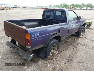 1995 Nissan Frontier XE with VIN 1N6SD11Y4SC318791, listed as a IAAI auction lot 42335599 with Not provided miles and . Bid and sale history available at DreamBid. Image 4.