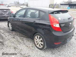 2012 Hyundai Accent SE with VIN KMHCU5AE7CU031523, listed as a IAAI auction lot 41519387 with 196,272 mi miles. Bid and sale history available at carsss.com. Image 3.