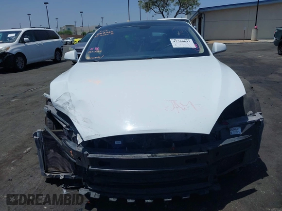 2014 Tesla Model S 60 с VIN 5YJSA1H17EFP40534, выставлен на аукционе IAAI как лот 42346697 с пробегом 203 166 миль миль и . История ставок и продаж доступна на DreamBid. Изображение 13.