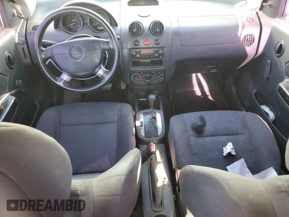 2006 Chevrolet Aveo LS with VIN KL1TD56616B542030, listed as a Copart auction lot 82115273 with 156,396 mi miles and Salvage title. Bid and sale history available at DreamBid. Image 8.