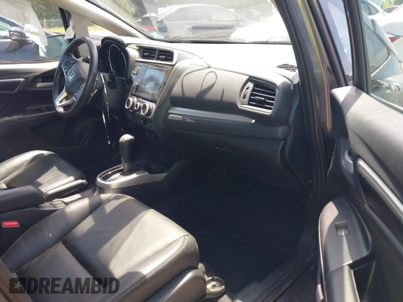 2020 Honda Fit EX-L z VIN 3HGGK5H90LM701665, wystawiony jako IAAI lot #42209084 z przebiegiem 79 395 mil mil oraz . Historia ofert i sprzedaży dostępna na DreamBid. Obrazek 5.