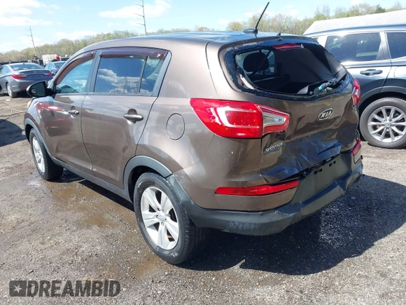 2012 Kia Sportage LX with VIN KNDPBCA27C7293143, listed as a IAAI auction lot 41980919 with 206,457 mi miles and . Bid and sale history available at DreamBid. Image 3.