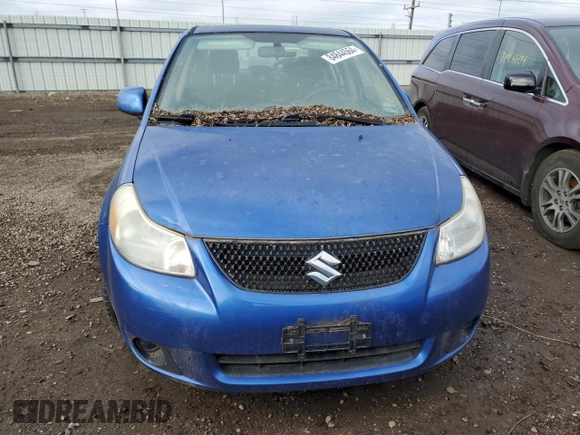 2012 Suzuki SX4 LE with VIN JS2YC5A35C6303573, listed as a Copart auction lot 84844564 with 0 mi miles and Clean Title. Bid and sale history available at carsss.com. Image 5.