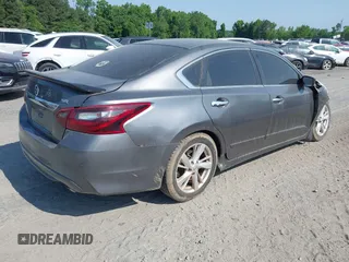 2017 Nissan Altima SV with VIN 1N4AL3AP8HC268108, listed as a IAAI auction lot 42033402 with 176,632 mi miles and . Bid and sale history available at DreamBid. Image 4.
