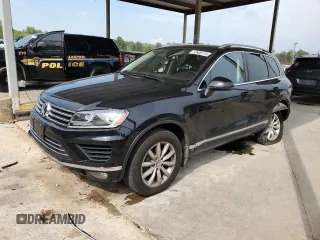 2016 Volkswagen Touareg Sport with VIN WVGEF9BP3GD007543, listed as a Copart auction lot 52806715 with 121,404 mi miles and Salvage Title. Bid and sale history available at DreamBid. Image 1.
