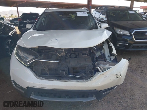 2017 Honda CR-V Touring with VIN 2HKRW1H97HH502128, listed as a IAAI auction lot 41939025 with 111,100 mi miles. Bid and sale history available at carsss.com. Image 6.