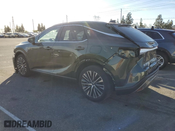 2023 Lexus RX with VIN JTJCHMAA0P2001696, listed as a Copart auction lot 85546714 with 10,798 mi miles and Salvage Title. Bid and sale history available at carsss.com. Image 2.