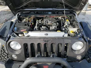 2018 Jeep Wrangler JK Unlimited Sport S with VIN 1C4BJWDG8JL812324, listed as a Copart auction lot 76595354 with 140,013 mi miles and Salvage Title. Bid and sale history available at carsss.com. Image 12.