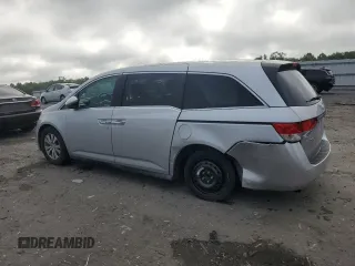 2014 Honda Odyssey EX-L with VIN 5FNRL5H62EB003236, listed as a Copart auction lot 63342255 with 147,398 mi miles and Salvage title. Bid and sale history available at DreamBid. Image 2.