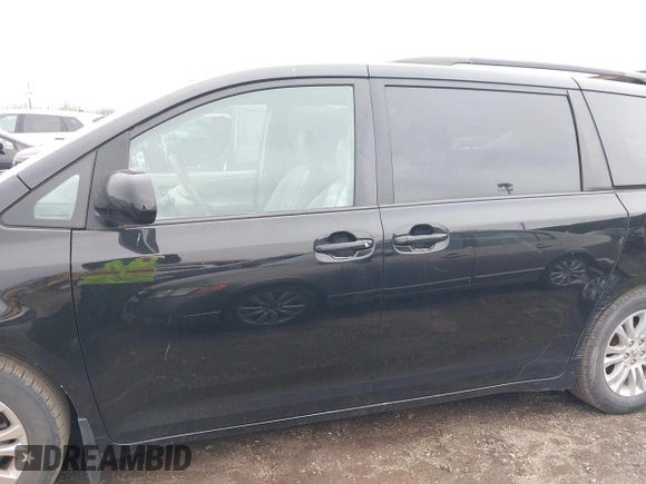 2011 Toyota Sienna XLE AAS with VIN 5TDYK3DC9BS071636, listed as a IAAI auction lot 41972332 with 204,477 mi miles and . Bid and sale history available at DreamBid. Image 15.