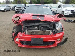 2014 MINI Coupe S z VIN WMWSX3C59ET409176, wystawiony jako Copart lot #72736864 z przebiegiem Nie podano mil oraz Szkody całkowita. Historia ofert i sprzedaży dostępna na DreamBid. Obrazek 5.