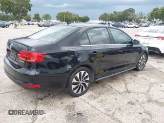 2013 Volkswagen Jetta Hybrid SE with VIN 3VW637AJ0DM281198, listed as a IAAI auction lot 42710130 with 68,068 mi miles and . Bid and sale history available at DreamBid. Image 4.