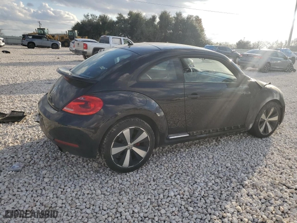2012 Volkswagen Beetle 2.0T Turbo PZEV with VIN 3VWVA7AT1CM618883, listed as a Copart auction lot 85873174 with 100,482 mi miles and Salvage Title. Bid and sale history available at carsss.com. Image 3.