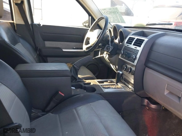 2007 Dodge Nitro SLT with VIN 1D8GU58K87W555759, listed as a IAAI auction lot 41690213 with 196,779 mi miles. Bid and sale history available at carsss.com. Image 5.