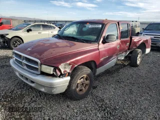 2002 Dodge Dakota SLT z VIN 1B7HL48N52S525130, wystawiony jako Copart lot #85956494 z przebiegiem 220 368 mil mil oraz Szkoda całkowita • Salvage title. Historia ofert i sprzedaży dostępna na DreamBid. Obrazek 1.