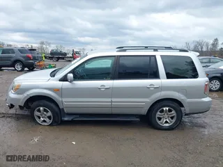 2006 Honda Pilot EX with VIN 2HKYF18426H553632, listed as a IAAI auction lot 41656610 with 154,470 mi miles. Bid and sale history available at carsss.com. Image 15.