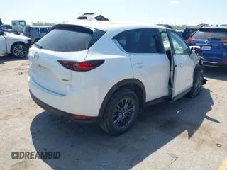 2019 Mazda CX-5 Touring with VIN JM3KFACM7K1656311, listed as a IAAI auction lot 41833187 with 83,888 mi miles. Bid and sale history available at carsss.com. Image 4.