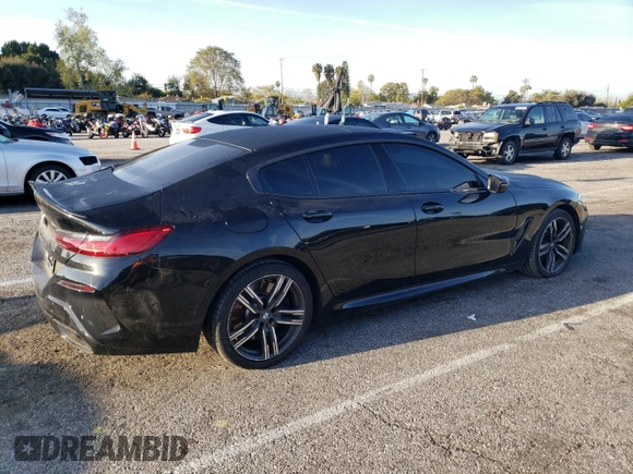 2020 BMW 8 Series 840i with VIN WBAGV4C06LCE28998, listed as a Copart auction lot 48566634 with 54,946 mi miles and Salvage title. Bid and sale history available at DreamBid. Image 3.