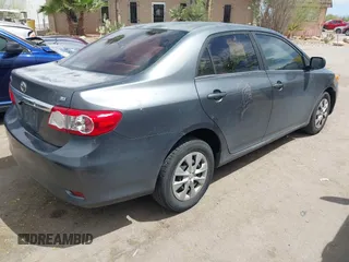 2011 Toyota Corolla L with VIN 2T1BU4EEXBC559590, listed as a IAAI auction lot 42101256 with 163,307 mi miles and . Bid and sale history available at DreamBid. Image 4.