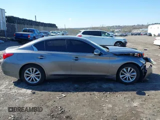 2015 Infiniti Q50 Premium with VIN JN1BV7AR2FM392399, listed as a IAAI auction lot 41978343 with 108,679 mi miles and . Bid and sale history available at DreamBid. Image 14.