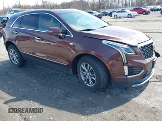 2022 Cadillac XT5 AWD Premium Luxury with VIN 1GYKNDRSXNZ108984, listed as a IAAI auction lot 41818007 with 56,793 mi miles and . Bid and sale history available at DreamBid. Image 1.