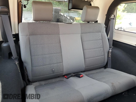 2007 Jeep Wrangler Sahara with VIN 1J8FA54167L208859, listed as a Copart auction lot 62299155 with 263,928 mi miles and Clean title. Bid and sale history available at DreamBid. Image 11.