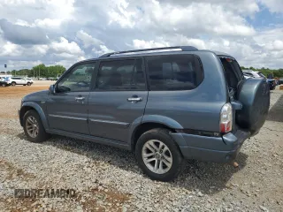 2005 Suzuki XL7 LX z VIN JS3TY92VX54102488, wystawiony jako Copart lot #56700595 z przebiegiem 169 827 mil mil oraz Szkody całkowita. Historia ofert i sprzedaży dostępna na DreamBid. Obrazek 2.