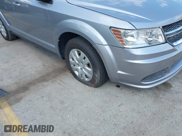 2016 Dodge Journey American Value with VIN 3C4PDCAB0GT134279, listed as a IAAI auction lot 42234584 with 166,437 mi miles and . Bid and sale history available at DreamBid. Image 6.
