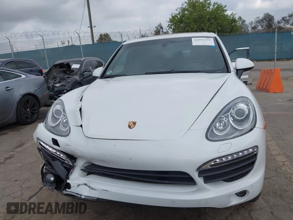 2014 Porsche Cayenne S Hybrid with VIN WP1AE2A28ELA51123, listed as a IAAI auction lot 42091475 with 41,341 mi miles and . Bid and sale history available at DreamBid. Image 12.