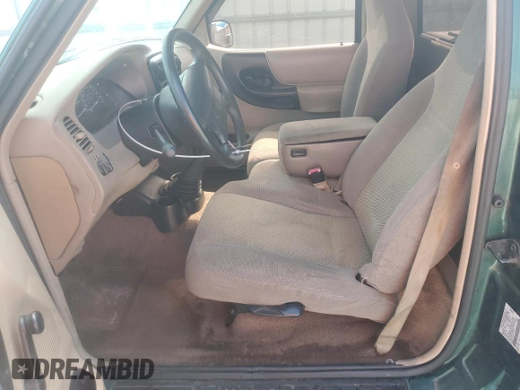 1999 Mazda B-Series Truck SX z VIN 4F4YR12CXXTM34917, wystawiony jako Copart lot #50821635 z przebiegiem 121 165 mil mil oraz Szkoda całkowita • Salvage title. Historia ofert i sprzedaży dostępna na DreamBid. Obrazek 7.