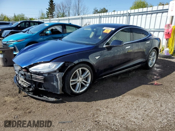 2014 Tesla Model S 60 z VIN 5YJSA1H10EFP35319, wystawiony jako Copart lot #53868745 z przebiegiem 209 424 mil mil oraz Szkoda całkowita • Salvage title. Historia ofert i sprzedaży dostępna na DreamBid. Obrazek 1.