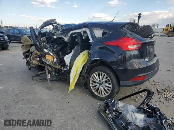 2017 Ford Focus Titanium z VIN 1FADP3N23HL291408, wystawiony jako Copart lot #83876124 z przebiegiem Nie podano mil oraz Szkoda całkowita • Salvage title. Historia ofert i sprzedaży dostępna na DreamBid. Obrazek 2.