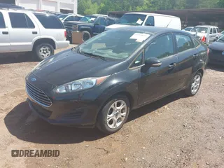 2015 Ford Fiesta SE with VIN 3FADP4BJ9FM113645, listed as a IAAI auction lot 41970671 with 138,026 mi miles. Bid and sale history available at carsss.com. Image 2.