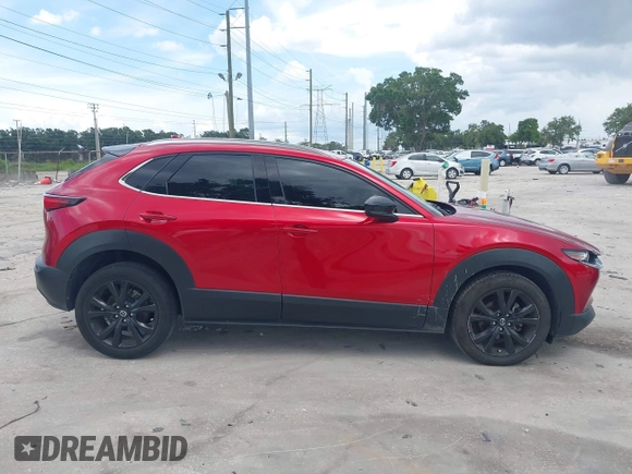 2023 Mazda CX-30 Premium с VIN 3MVDMBDY3PM507398, выставлен на аукционе IAAI как лот 42533176 с пробегом 15 788 миль миль и . История ставок и продаж доступна на DreamBid. Изображение 13.