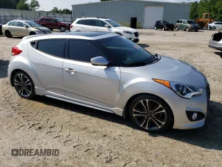2016 Hyundai Veloster Turbo with VIN KMHTC6AEXGU254380, listed as a Copart auction lot 60766373 with 135,056 mi miles. Bid and sale history available at carsss.com. Image 4.