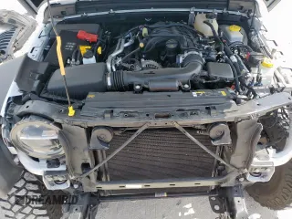 2022 Jeep Wrangler Sport S with VIN 1C4GJXAG5NW259605, listed as a Copart auction lot 57659775 with 14,864 mi miles and Salvage title. Bid and sale history available at DreamBid. Image 11.