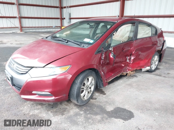 2010 Honda Insight EX with VIN JHMZE2H74AS033674, listed as a IAAI auction lot 41953858 with 144,018 mi miles and . Bid and sale history available at DreamBid. Image 2.