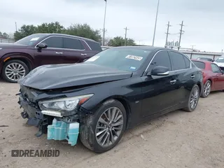 2018 Infiniti Q50 3.0t LUXE with VIN JN1EV7AP1JM351153, listed as a IAAI auction lot 41589119 with 103,915 mi miles. Bid and sale history available at carsss.com. Image 2.