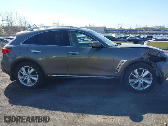 2012 Infiniti FX with VIN JN8AS1MWXCM156244, listed as a IAAI auction lot 41985306 with 107,039 mi miles and . Bid and sale history available at DreamBid. Image 13.
