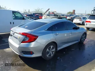 2020 Honda Civic LX with VIN 2HGFC2F6XLH533726, listed as a IAAI auction lot 41633882 with 141,835 mi miles and . Bid and sale history available at DreamBid. Image 4.