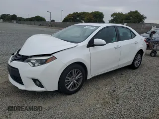 2014 Toyota Corolla L with VIN 5YFBURHE0EP047043, listed as a Copart auction lot 61663115 with 125,155 mi miles and Salvage title. Bid and sale history available at DreamBid. Image 1.