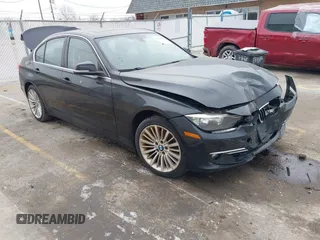 2014 BMW 3 Series 328i xDrive with VIN WBA3B5G56ENS06534, listed as a IAAI auction lot 41549553 with 165,779 mi miles. Bid and sale history available at carsss.com. Image 1.