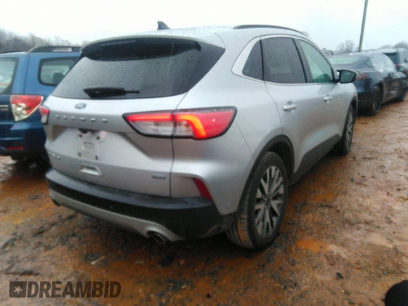 2020 Ford Escape Titanium Hybrid with VIN 1FMCU0DZ8LUB13911, listed as a IAAI auction lot 41249498 with 64,108 mi miles and . Bid and sale history available at DreamBid. Image 4.