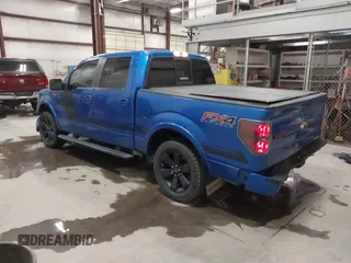 2014 Ford F-150 XL with VIN 1FTFW1ET1EFB79025, listed as a IAAI auction lot 42062995 with 133,415 mi miles. Bid and sale history available at carsss.com. Image 3.