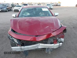 2014 Chevrolet Impala LTZ z VIN 1G1155S32EU141591, wystawiony jako IAAI lot #42150675 z przebiegiem Nie podano mil oraz . Historia ofert i sprzedaży dostępna na DreamBid. Obrazek 12.